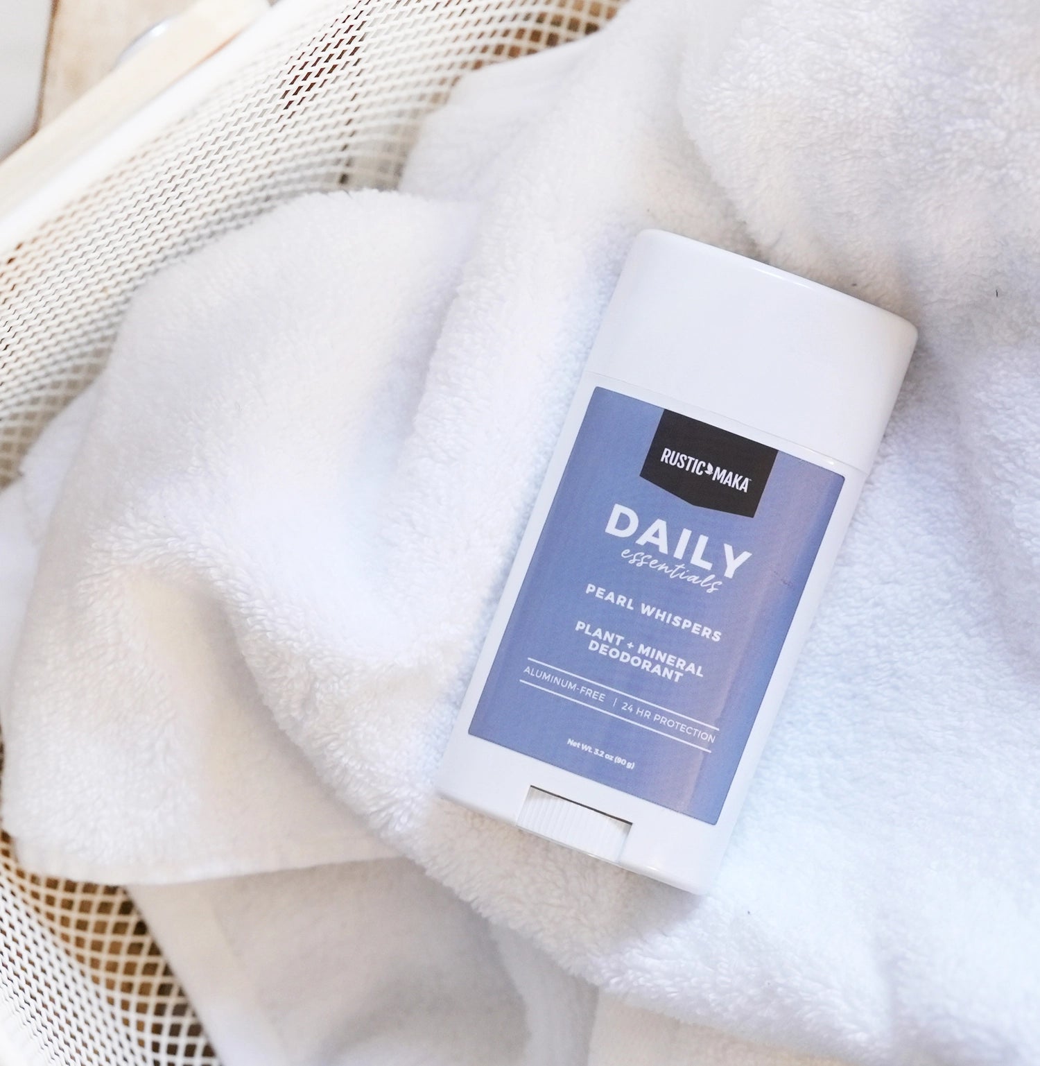 deodorant with blue label on a white towel